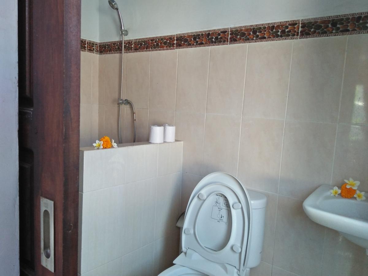 Tira Amed Homestay Esterno foto